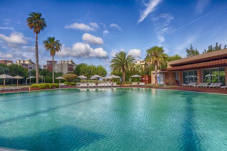 Outdoor pool at Aqualuz Suite Hotel