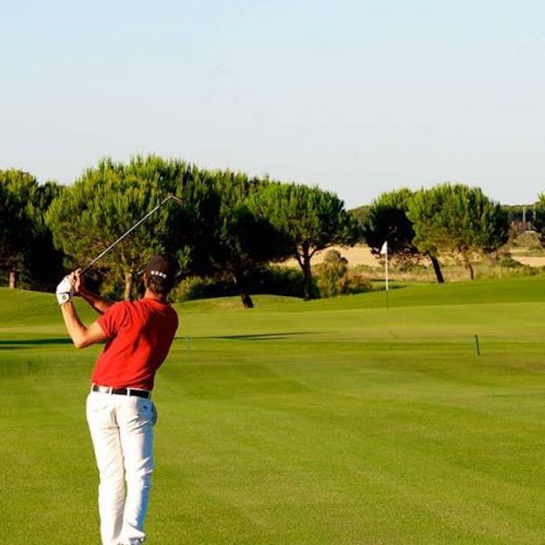 Golfer chips to the Green on La Estancia Golf, Chiclana de la Frontera, Cadiz