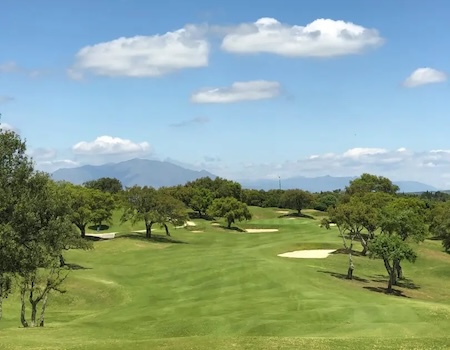 Fairway on San Roque Resort with view to the mountains